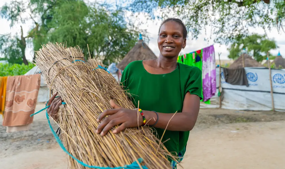 Mary se esfuerza por mantener a su familia mientras trabaja en una tienda de té. Recibió apoyo en salud mental por parte de MSF.