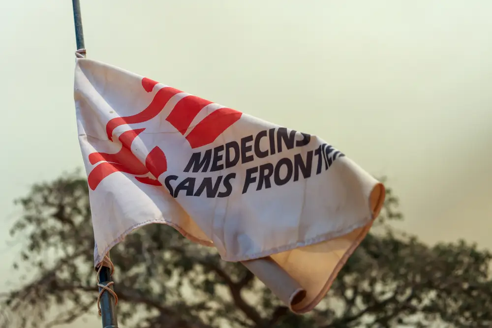 MSF flag blowing in the wind at Aweil project base.